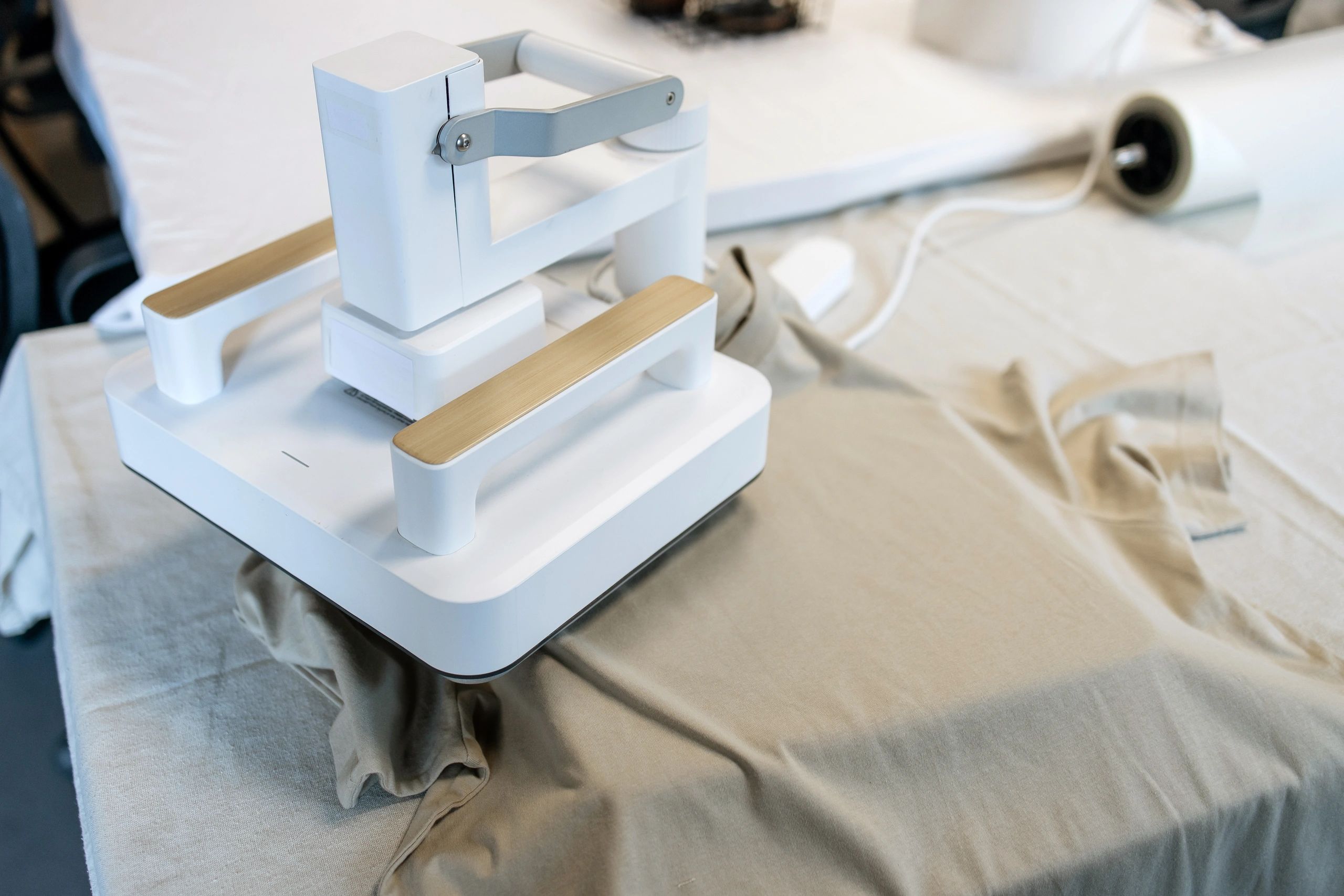Close-up of a heat press machine printing a t-shirt